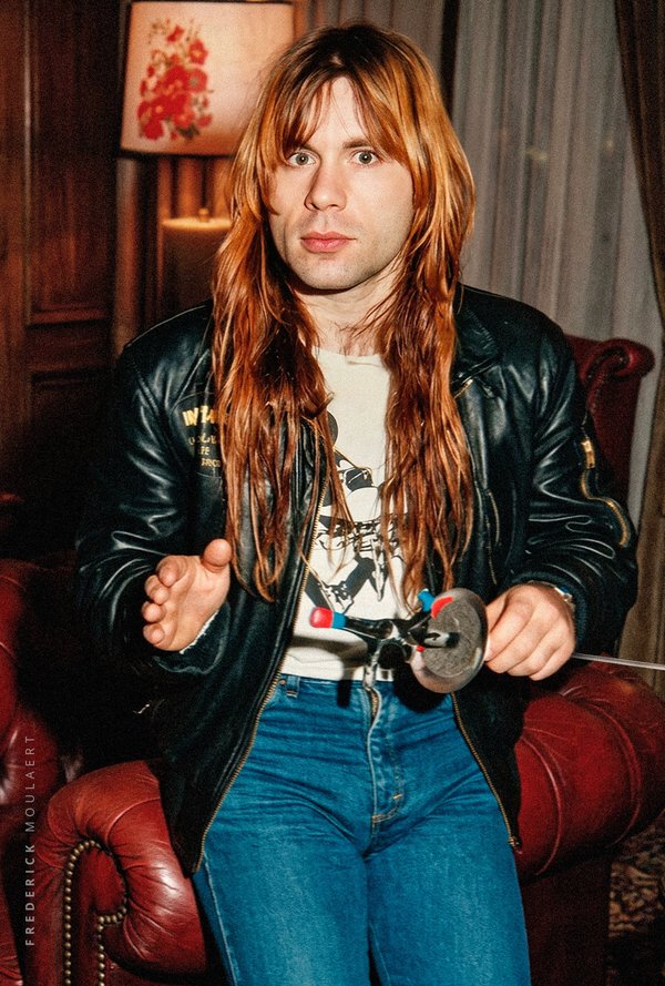 Bruce Dickinson in Europa Hotel lounge, Brussels - World Slavery Tour 84 (real photo but Bruce was isolated with AI)
